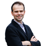 close up adult male drivers ed student smiling and crossing his arms