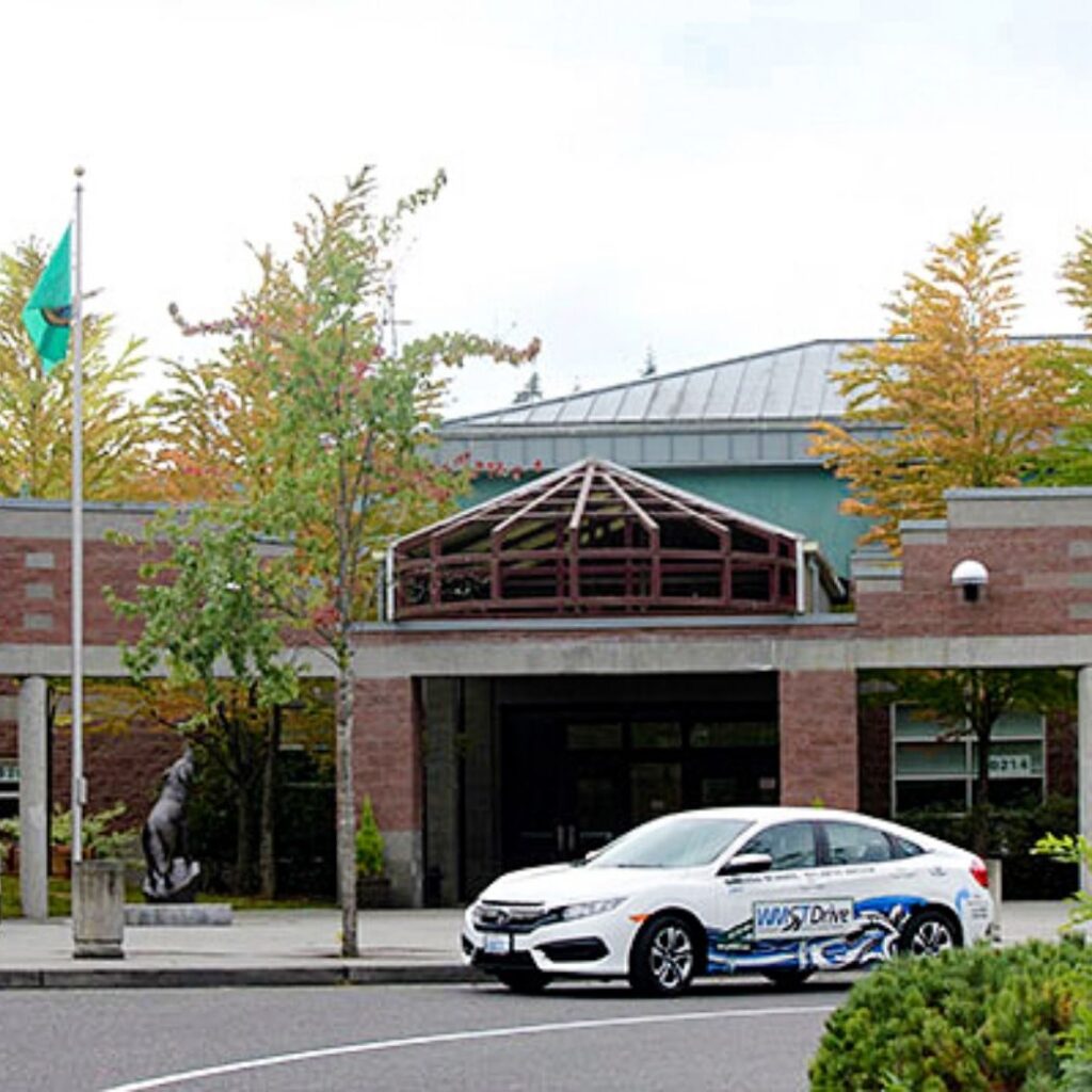 drivers education car parked in front of jackson high school in mill creek washington